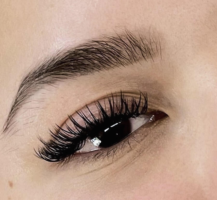 Untitled Full, fluffy lash extension set on a client